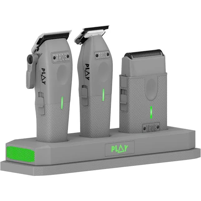 TPOB PLAY Mini professional barber set featuring a cordless clipper, trimmer, foil shaver, and charging dock in green retail packaging gray. 
